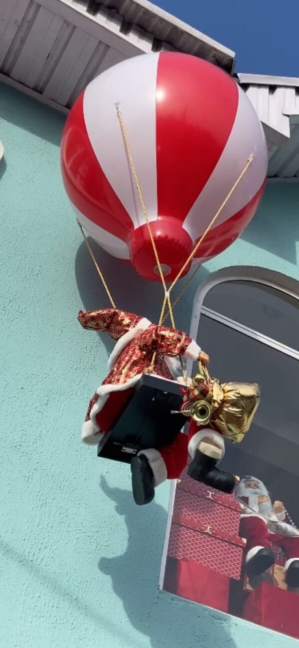 Santa with balloon and music